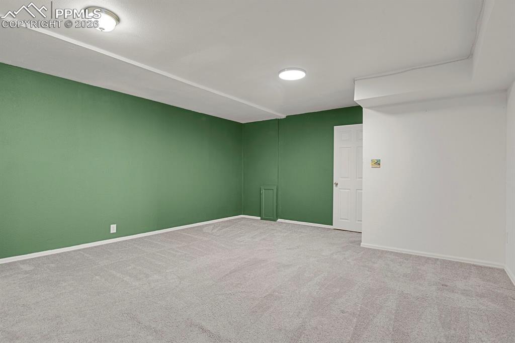 Image 17 of 19: Family Room with Carpet