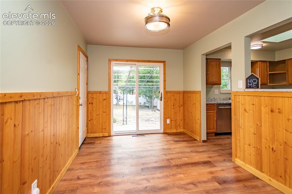 Image 10 of 46: Dining area to kitchen