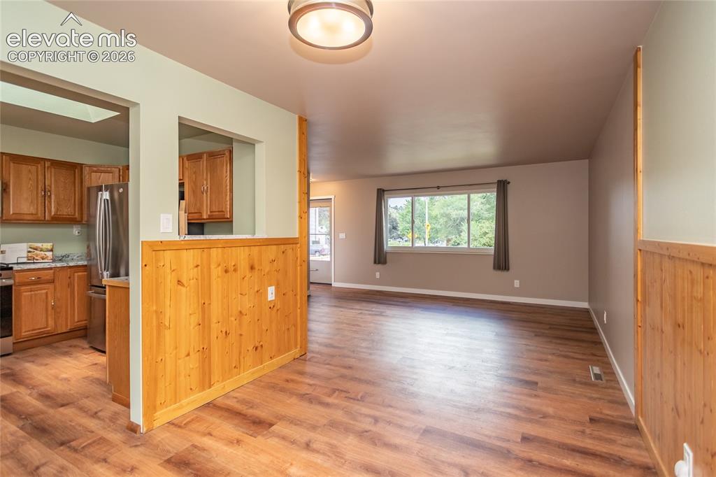 Image 11 of 46: Looking towards living room