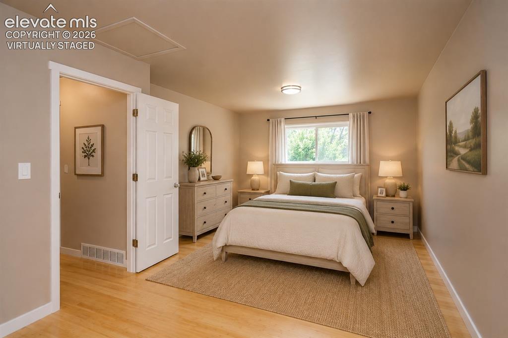 Image 16 of 46: Virtually staged primary bedroom