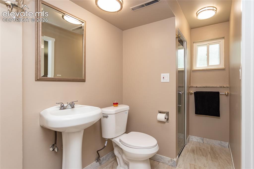 Image 33 of 46: Totally redone lower level bathroom