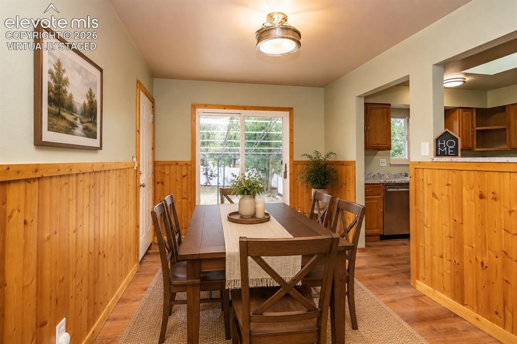Image 9 of 46: Virtually staged dining area