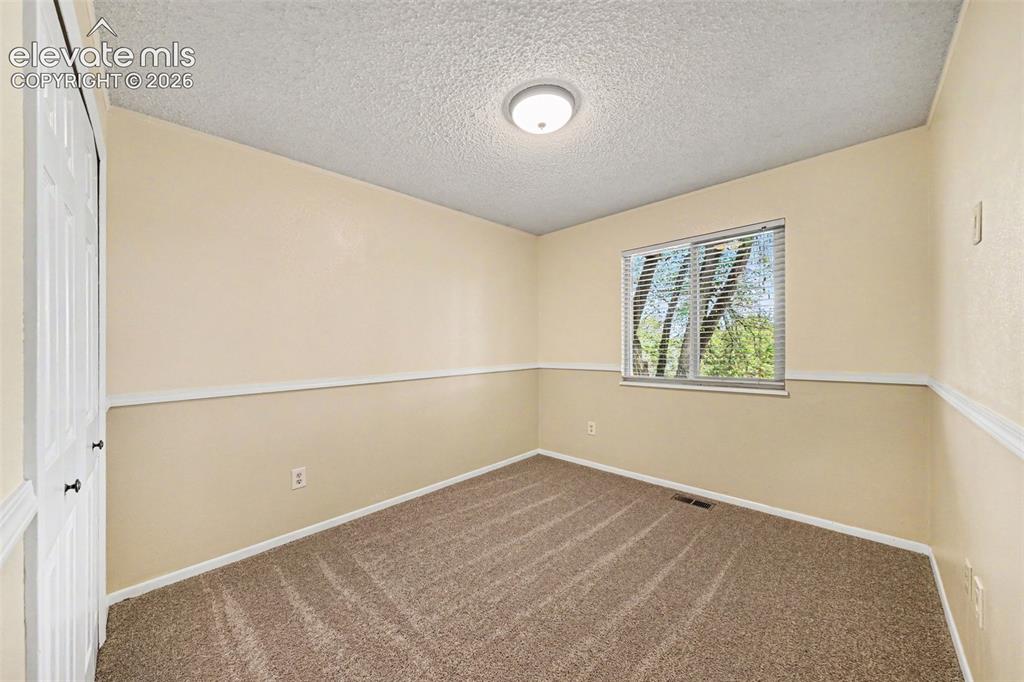 Image 18 of 37: Bedroom