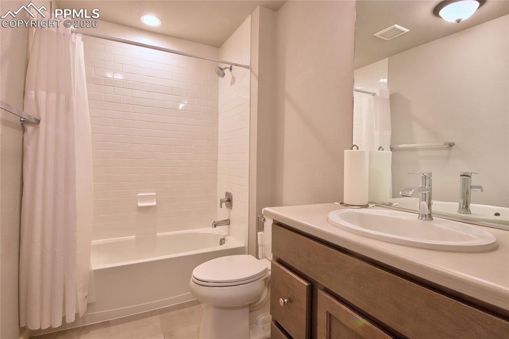 Image 21 of 25: Full bathroom on lower level