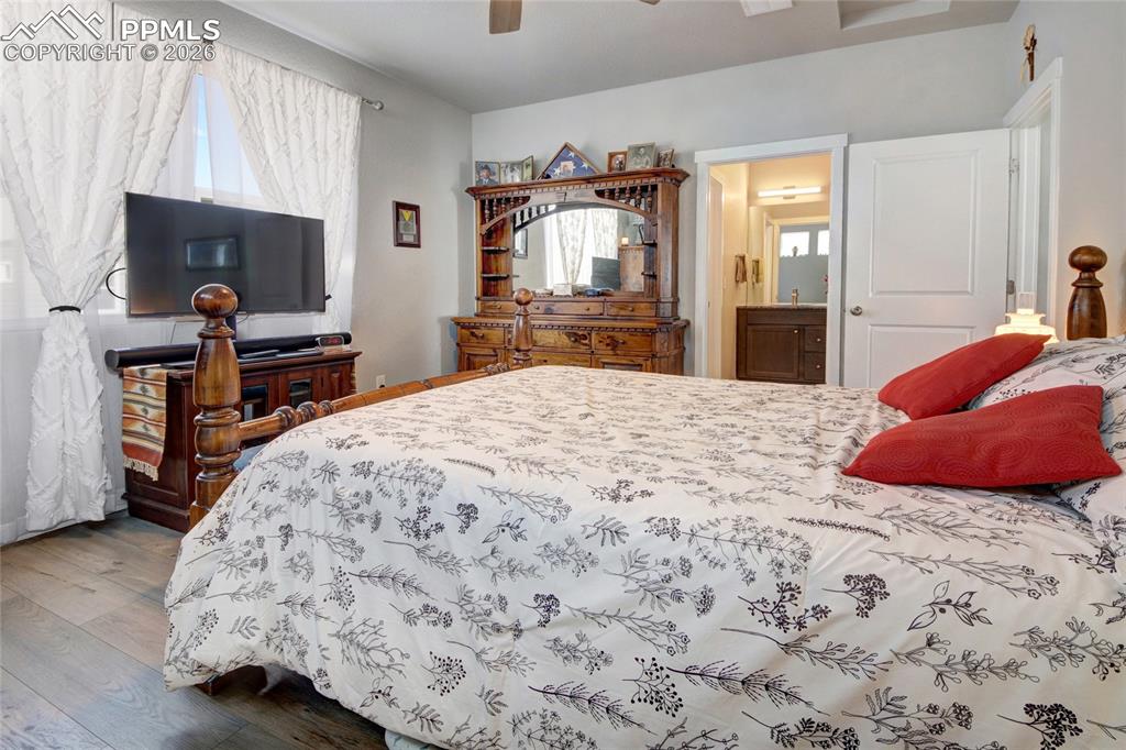 Image 4 of 25: Master bedroom adjoins to bath