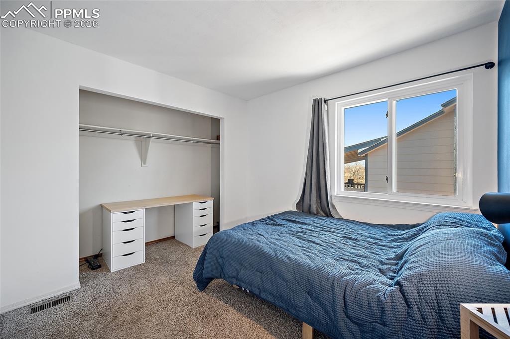 Image 28 of 49: Bedroom