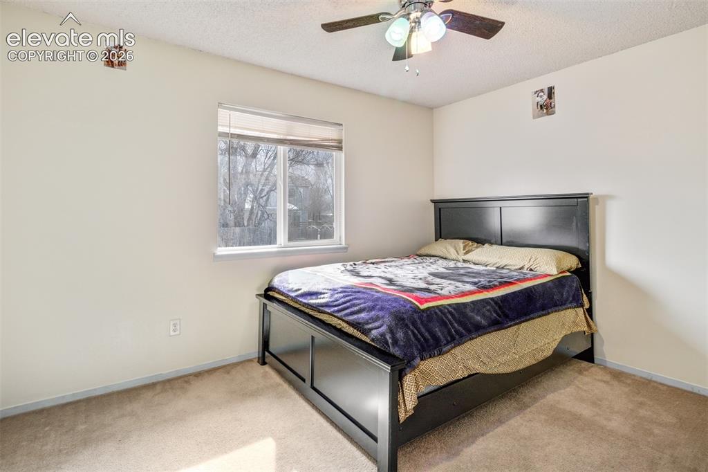 Image 13 of 21: Bedroom