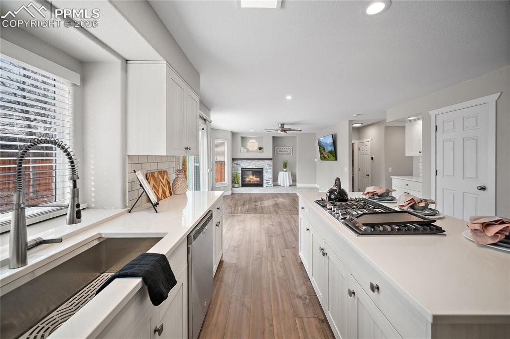 Image 11 of 46: Stunning new kitchen open to the family room. 