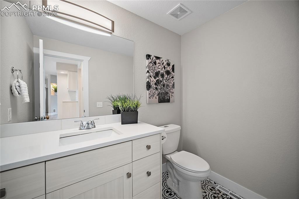 Image 19 of 46: Main level 1/2 bath. 