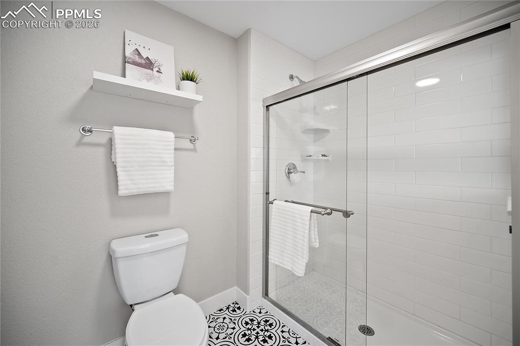 Image 27 of 46: Large walk-in shower.