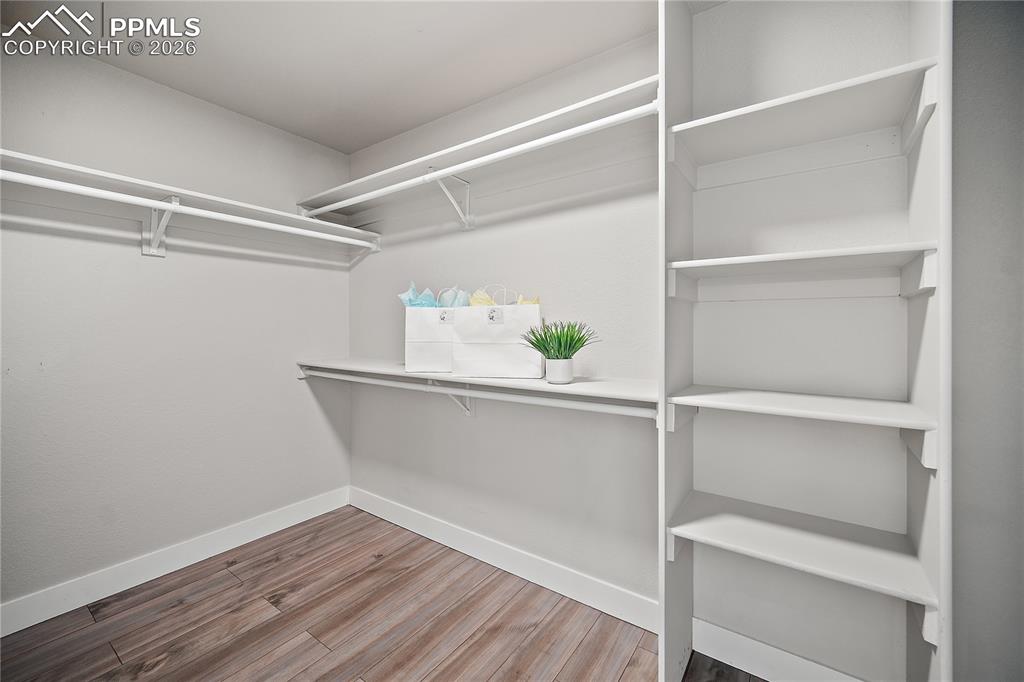 Image 28 of 46: Walk-in closet