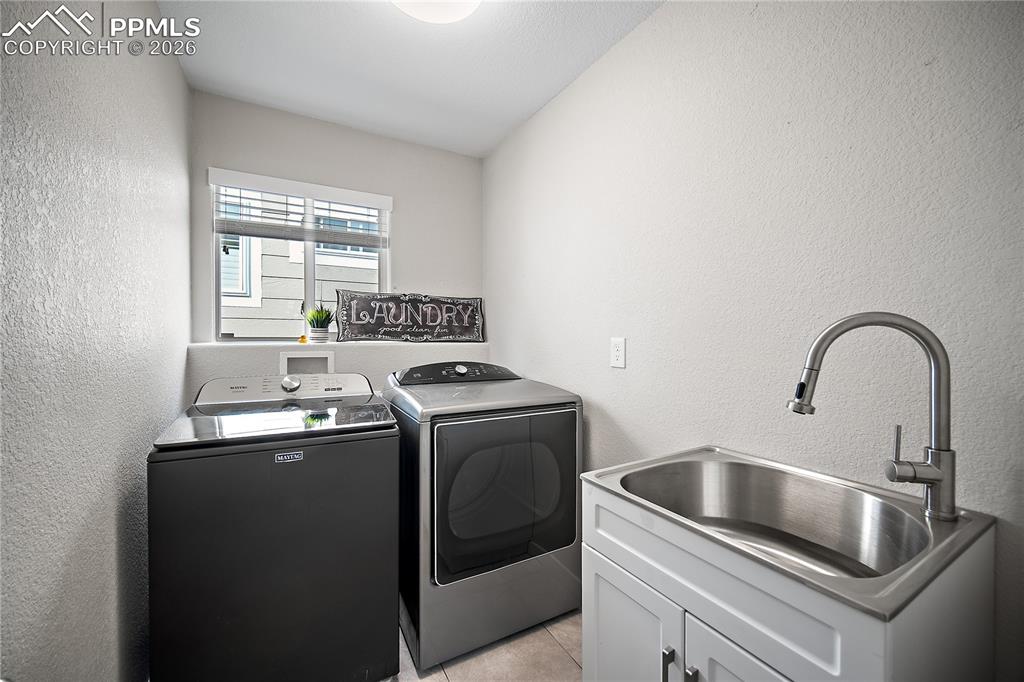 Image 33 of 46: Laundry room is conveniently located upstairs  