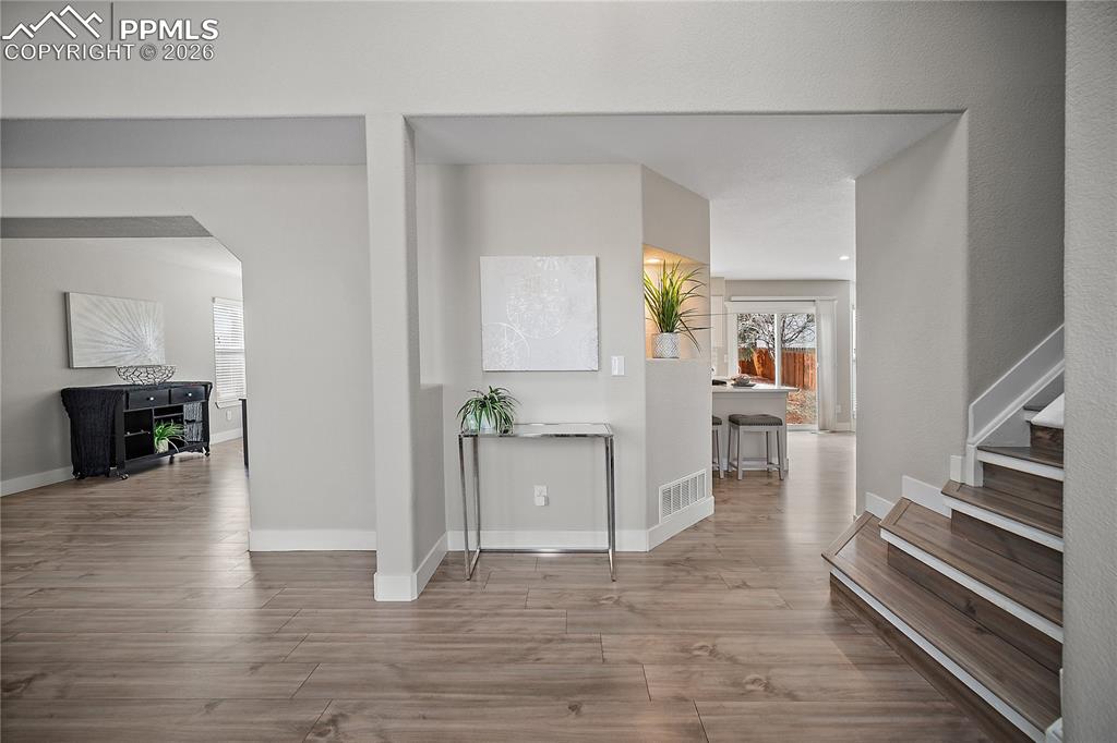Image 4 of 46: Spacious foyer, formal living to the left. 