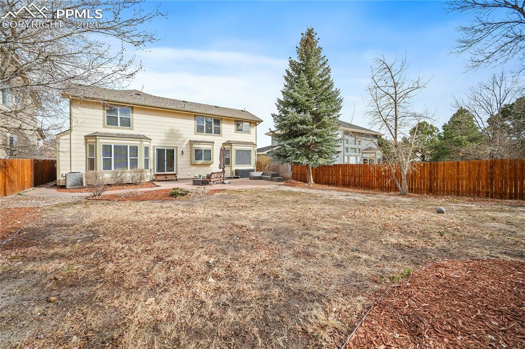 Image 42 of 46: Mature trees and newer fence. 