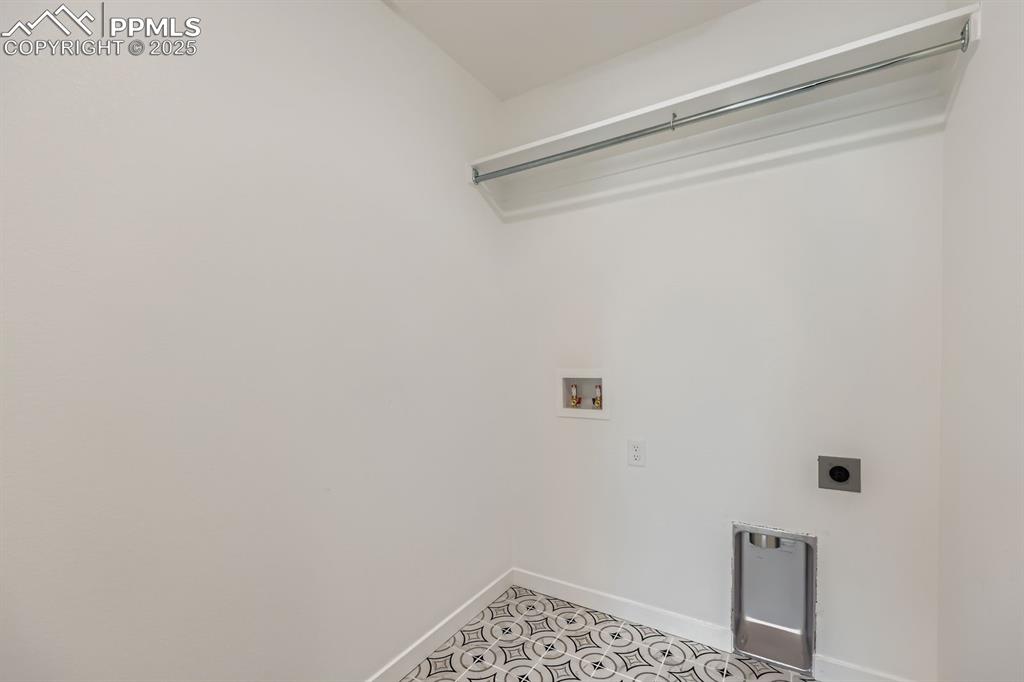 Image 24 of 28: Laundry room with hookup for a washing machine and hookup for an electric d
