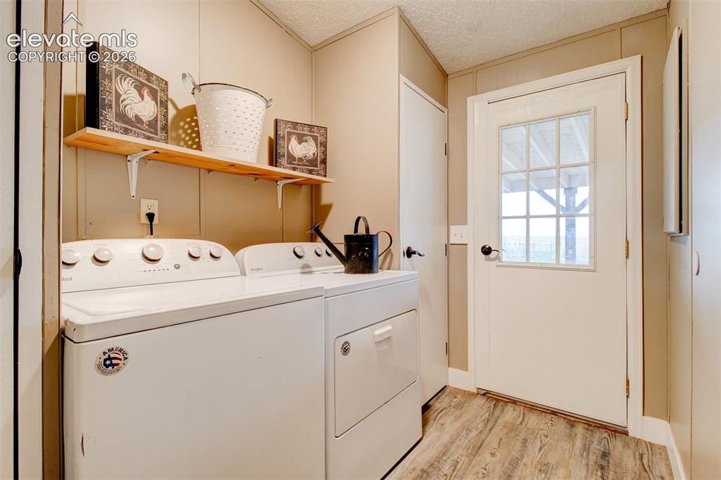 Image 21 of 42: Laundry/Back entry