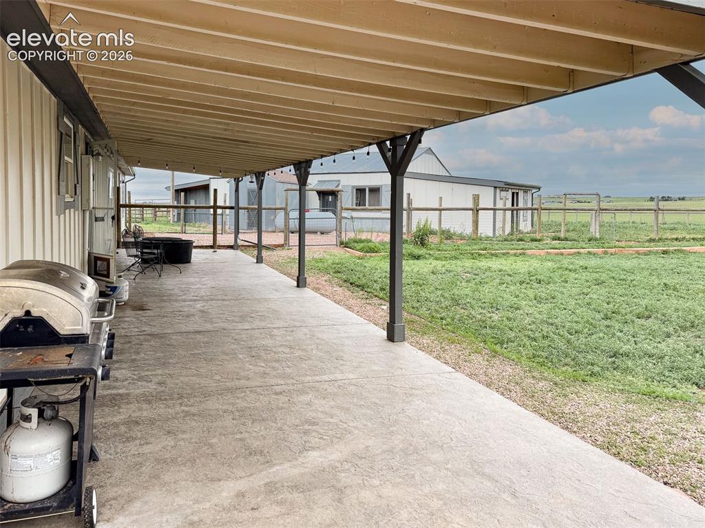 Image 22 of 42: Rear covered patio