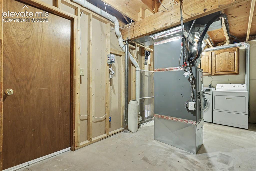 Image 36 of 41: Huge storage area in basement