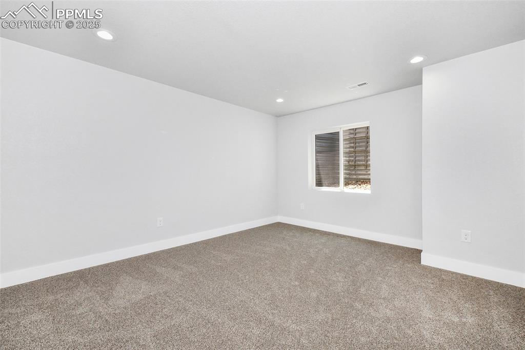 Image 41 of 44: Carpeted empty room featuring recessed lighting