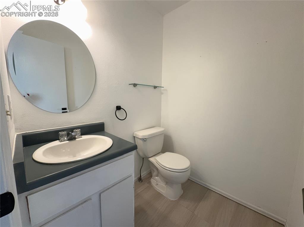 Image 12 of 28: Main level half bath