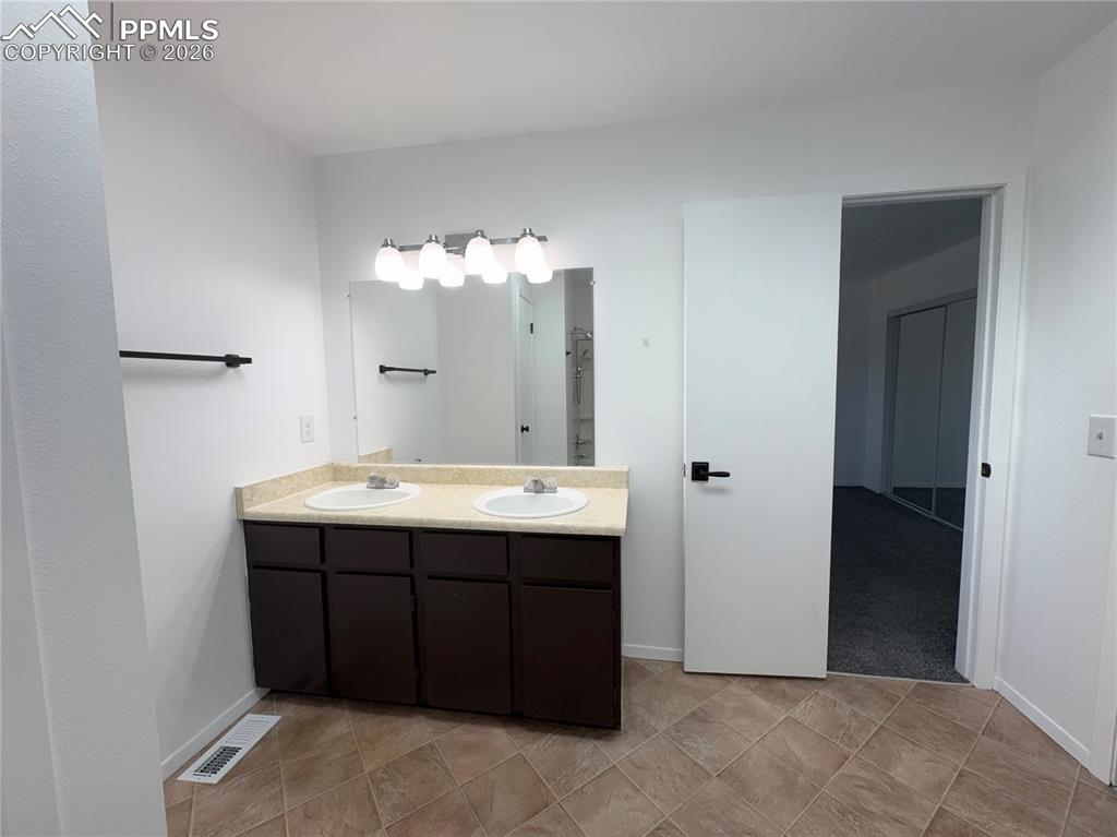 Image 14 of 28: Upper level Primary Bathroom