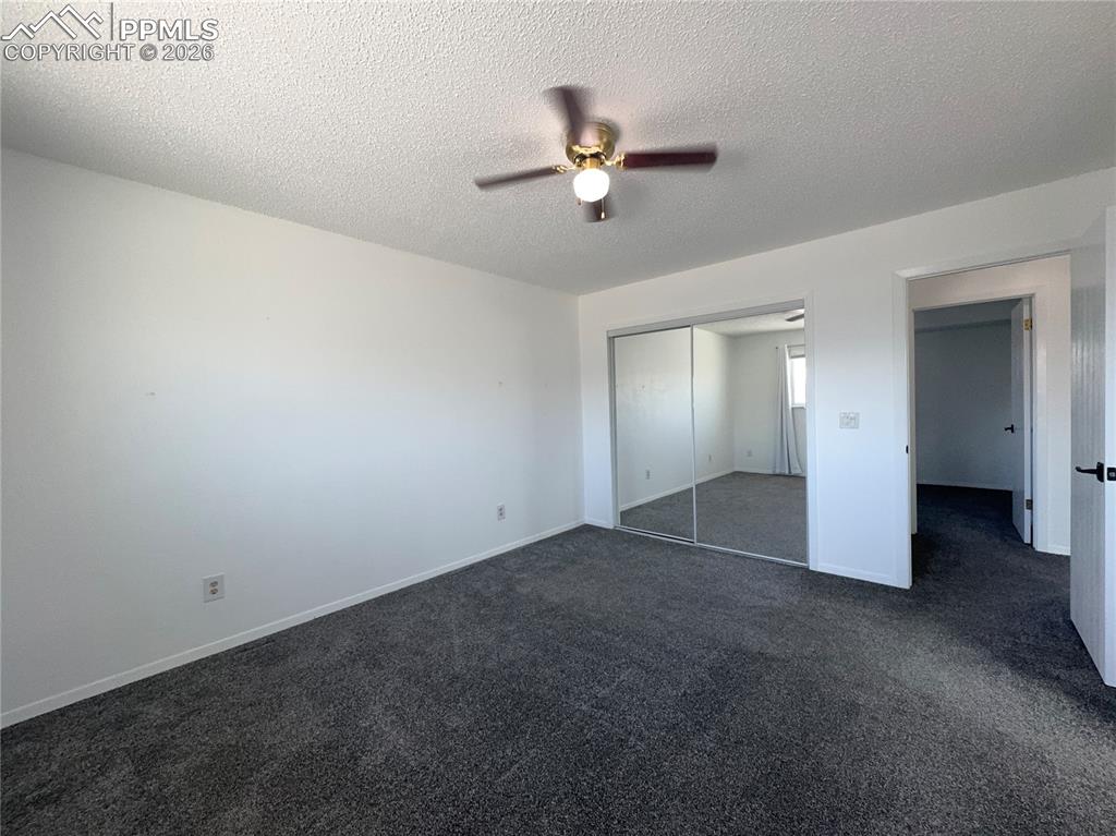 Image 16 of 28: Upper level Primary Bedroom