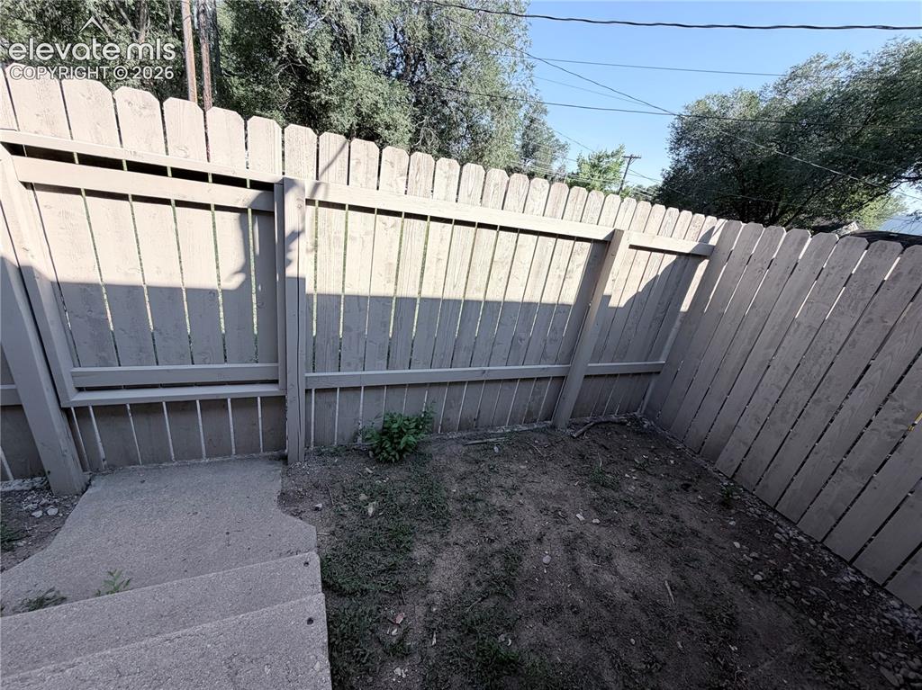 Image 10 of 10: Fenced Backyard backs to Open Space