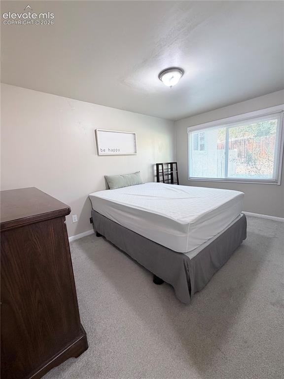 Image 8 of 10: Furnished Primary Bedroom