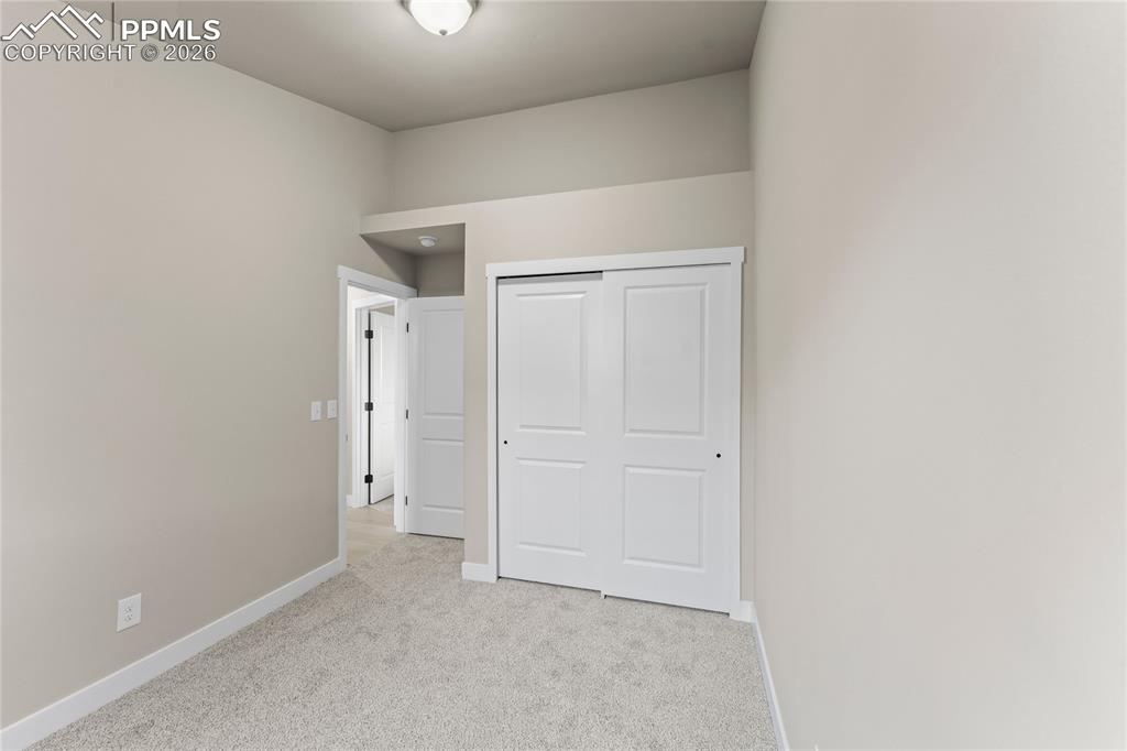 Image 21 of 29: Additional Guest Room Main Level