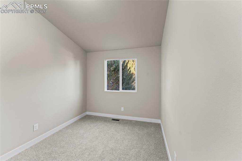 Image 22 of 29: Additional Guest Room Main Level