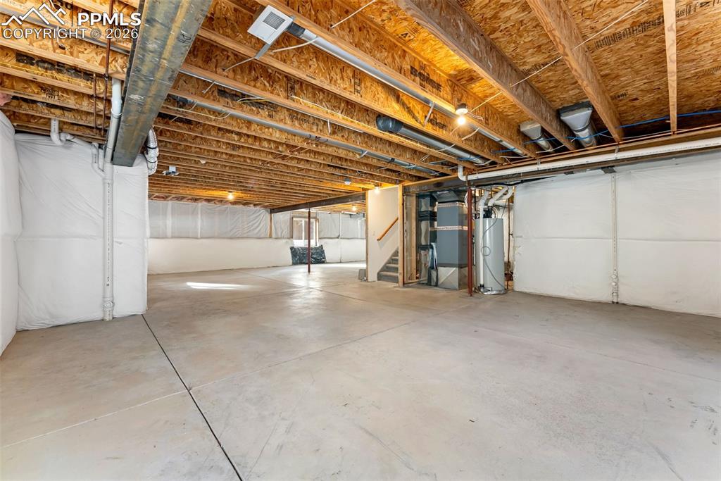Image 24 of 28: Unfinished Basement space to add 2 additional bedrooms, 1 bathroom, rec roo