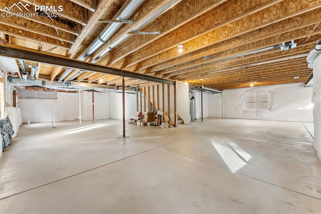 Image 25 of 28: Unfinished Basement space to add 2 additional bedrooms, 1 bathroom, rec roo