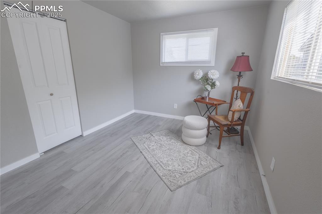 Image 15 of 21: Sitting room featuring baseboards and light wood finished floors
