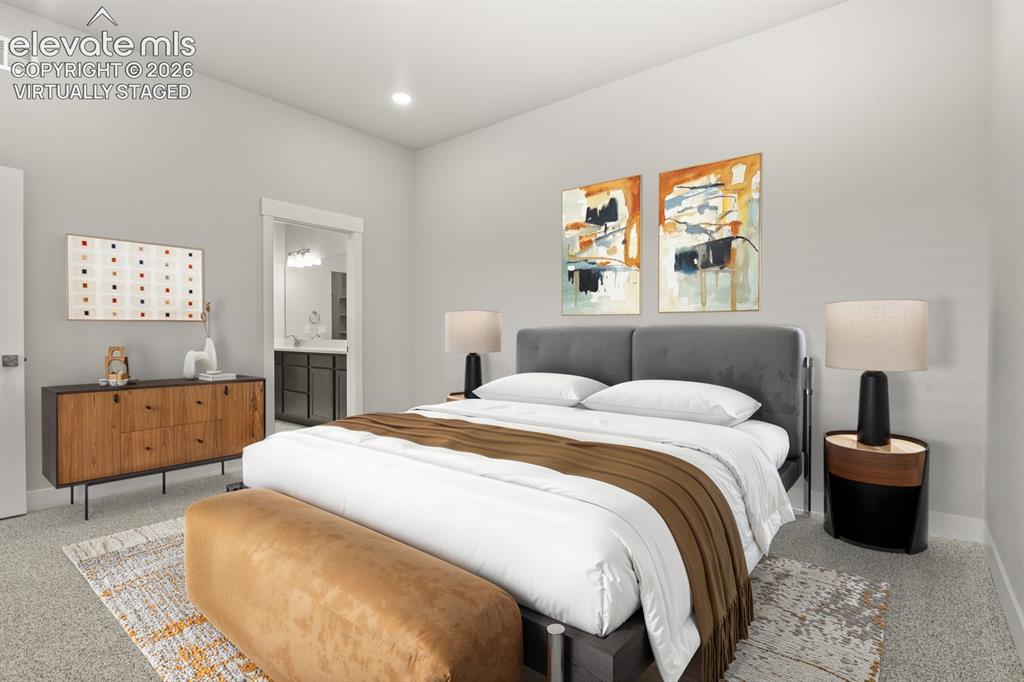 Image 13 of 50: Large primary suite. Virtually Staged