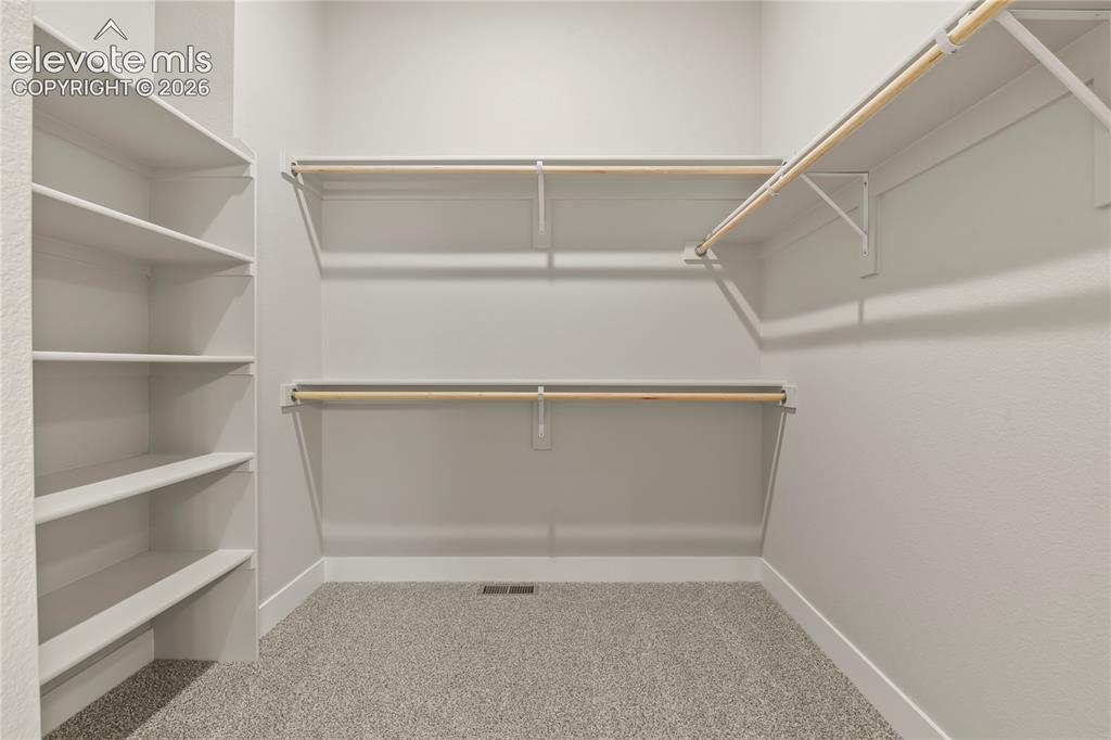Image 15 of 50: Walk-In Closets