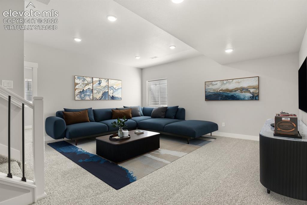 Image 19 of 50: Lower level family room with 9