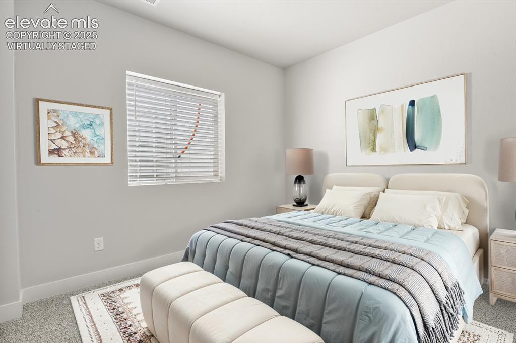 Image 21 of 50: Lower level third bedroom. Virtually Staged