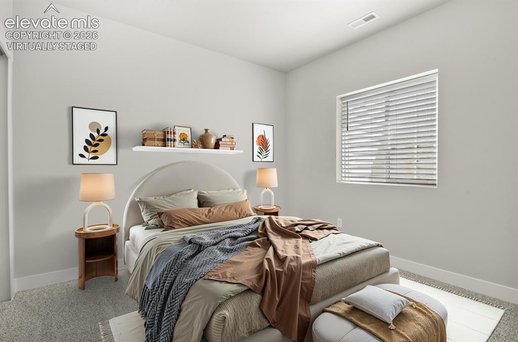Image 23 of 50: Lower level fourth bedroom. Virtually Staged
