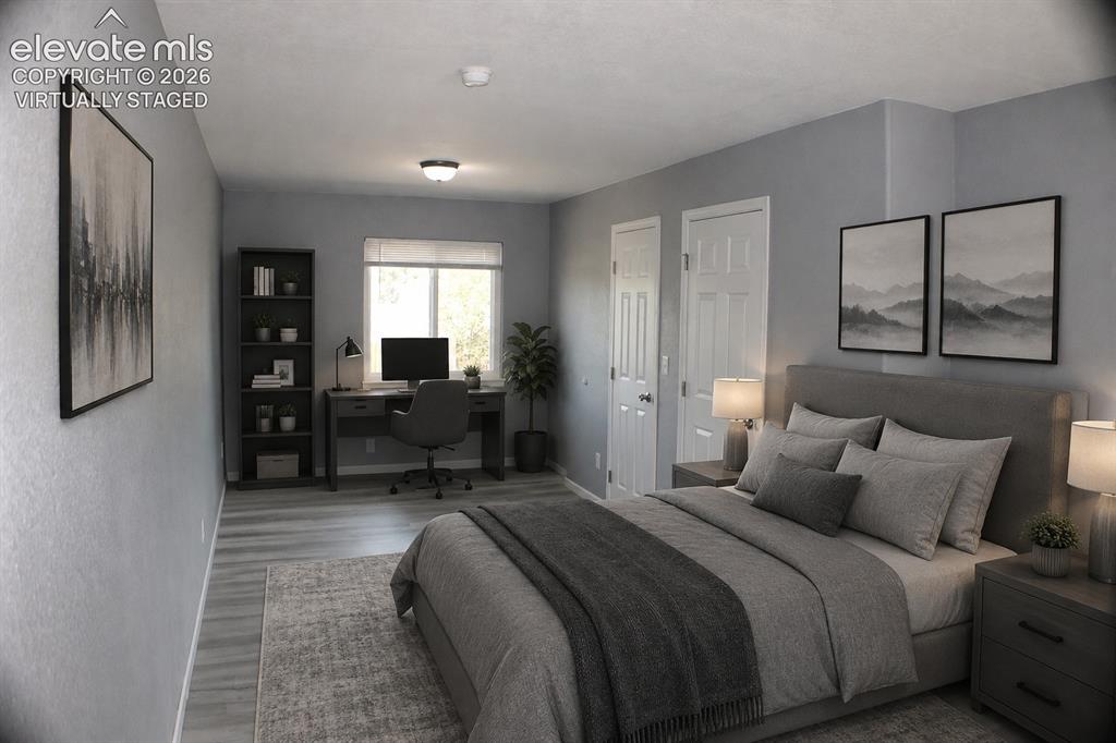 Image 15 of 28: Wood-finish flooring throughout virtually staged