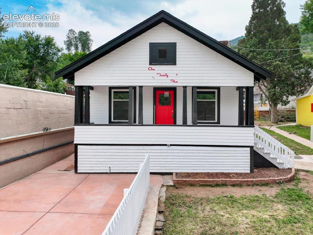 Image 1 of 28: 125 Ruxton is a refreshed home from 1909 and part of quintessential Manitou