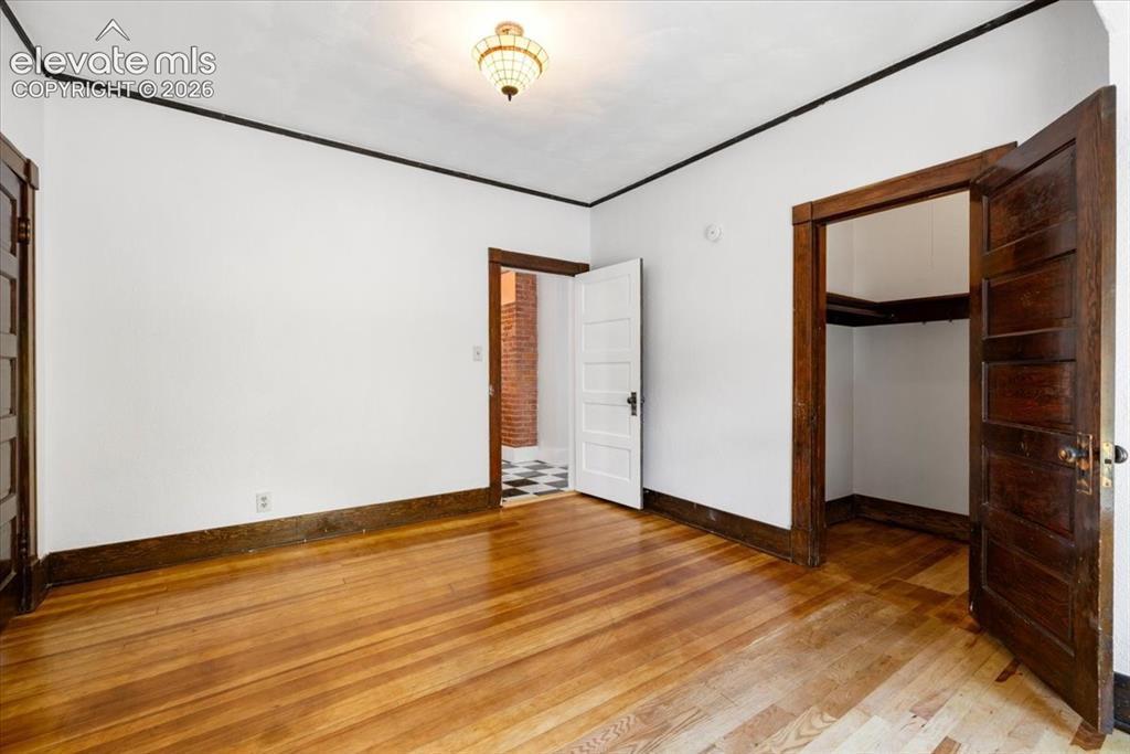 Image 17 of 28: Walk-in closet