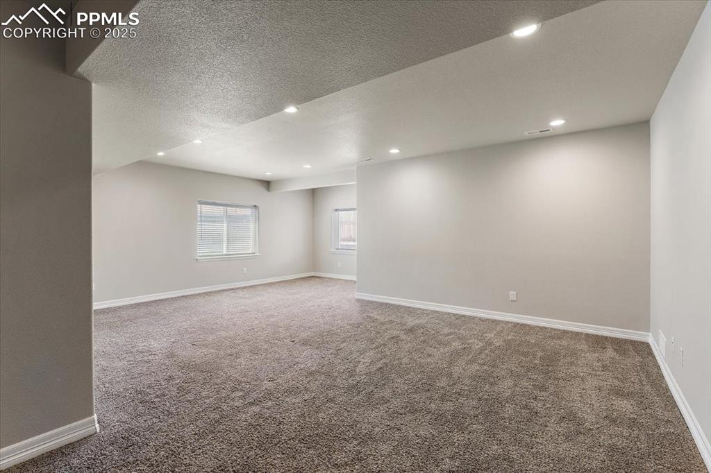 Image 17 of 48: Lower level family room