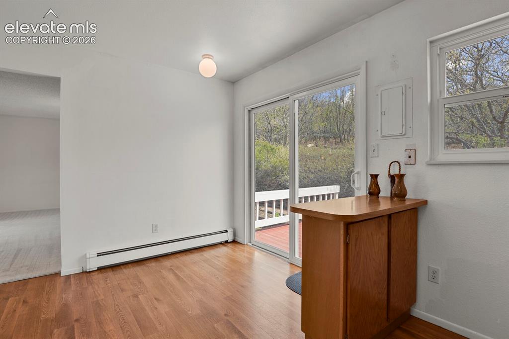 Image 11 of 37: with walk out to 3 tiered decks/patios