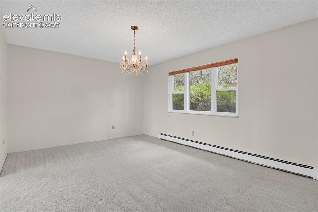 Image 15 of 37: Separate dining room-upper