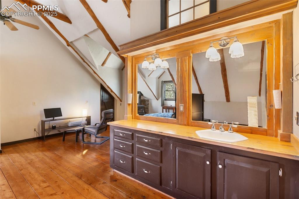 Image 28 of 48: Upper level primary suite