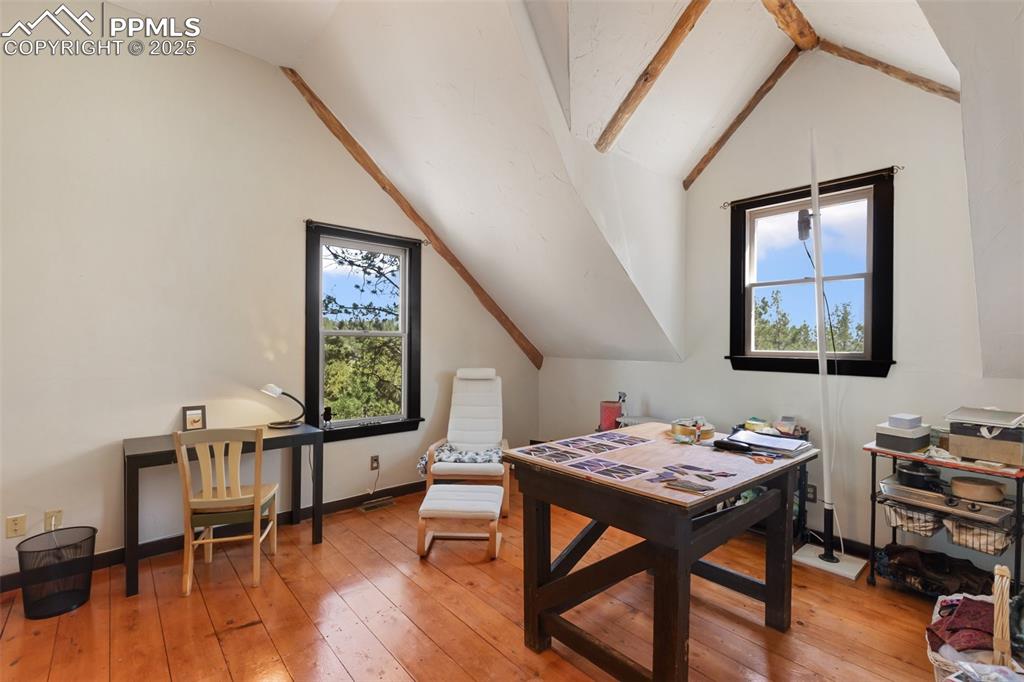 Image 29 of 48: Upstairs nursery, art, quilting or nonconforming bedroom