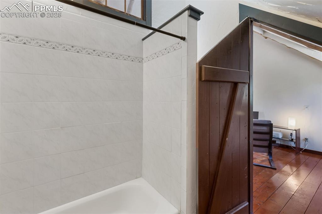 Image 30 of 48: Upper level primary suite