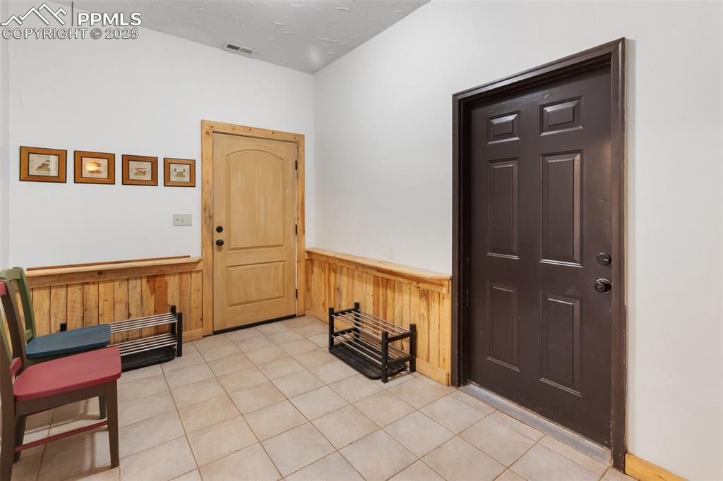 Image 33 of 48: Main entrance on basement level