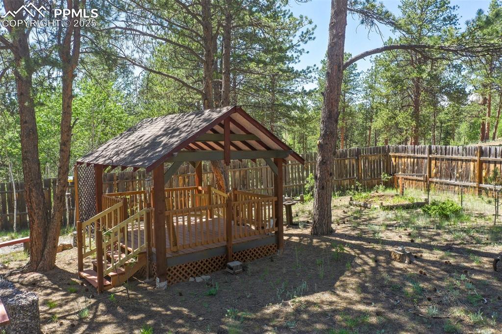 Image 6 of 48: Outside "gazebo" in back yard.