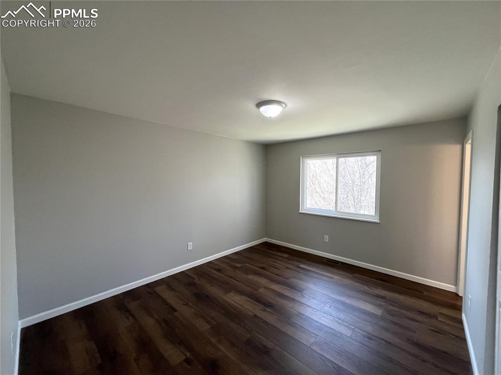 Image 12 of 23: Primary Bedroom with attached 3/4 Bathroom